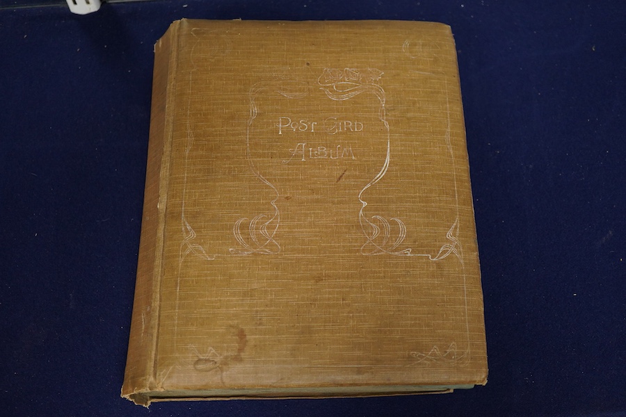 A postcard album containing approximately 160 early to mid 20th century railway related postcards, contained within an Edwardian postcard album, most are unused and unposted, most featuring locomotives and rolling stock,